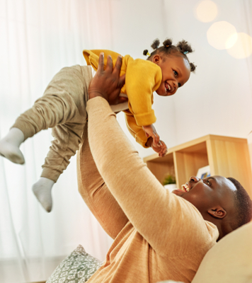 Father playing with daughter