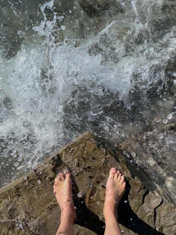 feet on a rock