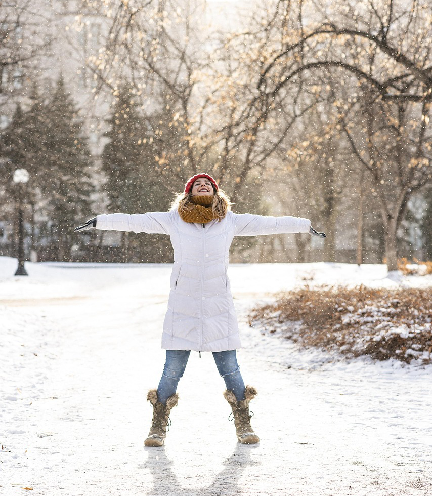 happy woman in the snow