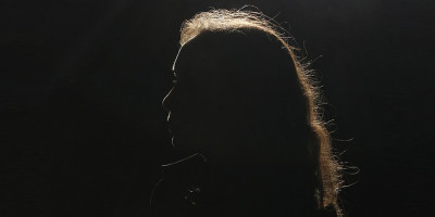 woman in the shadows
