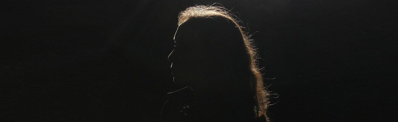 woman in the shadows