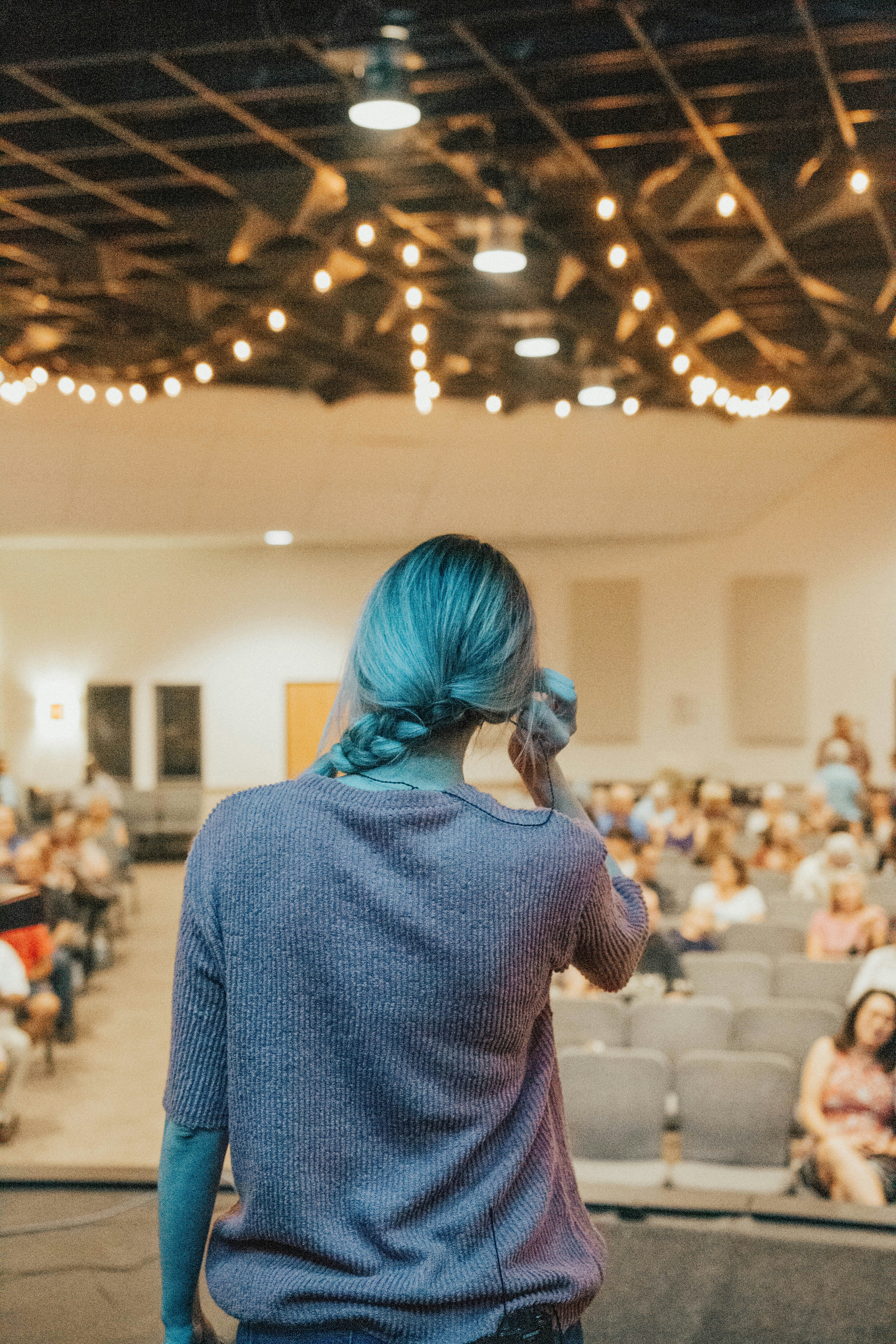 Woman in front of an audience